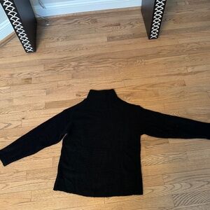 Mock neck black sweater.